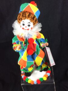 Madame Alexander clown doll in multi colored outfit