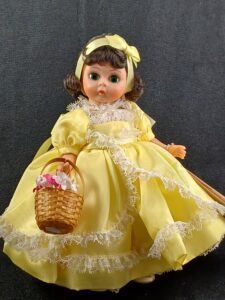 Madame Alexander doll in yellow dress