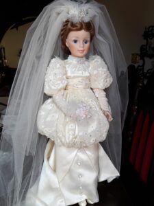 Madame Alexander porcelain bride doll in ivory dress