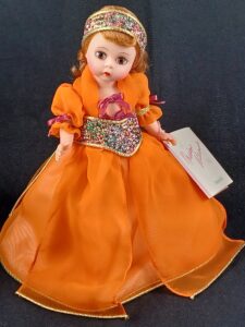 Madame Alexander doll Beauty in orange dress