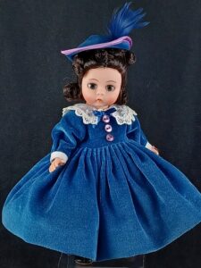 Madame Alexander doll in blue velvet dress