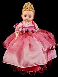 Madame Alexander doll in pink dress