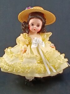 Madame Alexander doll in yellow dress